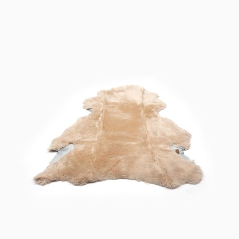 Warmbat schapenvacht kort camel