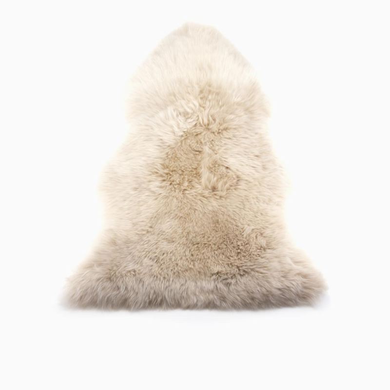 Warmbat schapenvacht long wool blush