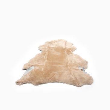 Warmbat schapenvacht camel 